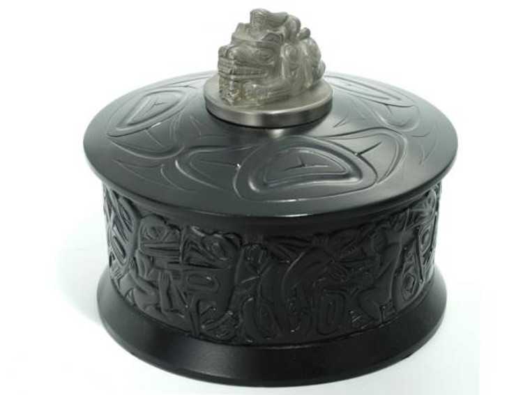 Round black marble box with West Coast First Nations' design and pewter lid ornament.