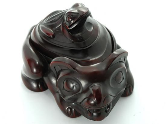 Rosewood spirit box carved in West Coast First Nations bear and frog design.