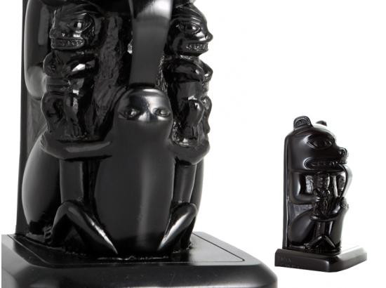Black recycled glass bookend featuring West Coast First Nations bear design.