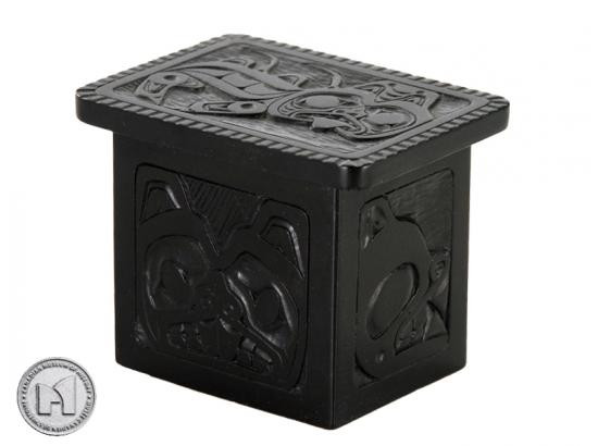 Black marble box with West Coast First Nations' sea monster design.
