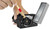 Brushing the disc mount of the Ski Man Bravo Sharp World Cup clean