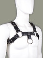 Side view of black bondage harness worn on mannequin