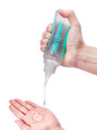 clear lubricant gel pouring from nozzle smooth texture