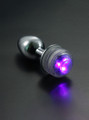 illuminated anal plug purple LED light close up