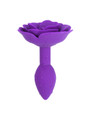 Purple rose anal plug standing upright