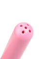lose-up of pink ABS thick tube douche nozzle tip with multiple rinse holes