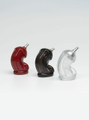 Clear, black, and red silicone sleeve attachments for piss play tube kit