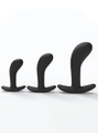 Black curved silicone butt plug set with three size options for anal training