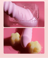 Pink silicone thrusting vibrator showing internal shaft movement and external textured clitoral stimulation