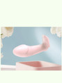 Pink wearable butterfly vibrator displayed on pastel background with curved internal arm and external teaser