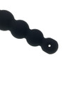 Close up of black beaded anal douche nozzle with outlet holes at the tip