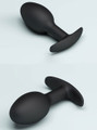 Black silicone anchor butt plug shown from multiple angles with wide curved base