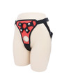 Red faux leather strap-on harness colour option shown on mannequin with adjustable black straps.