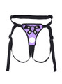 Flat lay of Purple faux leather strap-on harness with front opening, strap details and black trim.
