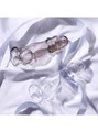 Crystal Clear and Crystal Black bubble textured hollow penis sleeves displayed together on satin