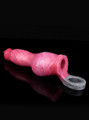 Red marbled penis sleeve lying on black surface with hollow base opening and grey ball loop visible