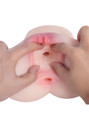 Serena TPE masturbator opened to show the layered folds inside the pussy