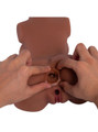 Close-up of the rounded gripping texture inside Nia's anal hole with her pussy visible below