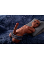 Tyson brown male sex doll reclining on a pillow wearing black underwear