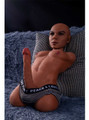 Tyson brown male sex doll wearing black underwear with realistic face and cock exposed