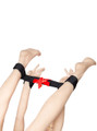 Adjustable nylon bondage restraint with elegant red bow detail.