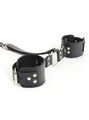 Close-up view of the leather wrist cuffs and straps