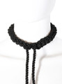 Shibari-inspired black rope collar and leash set displayed on a mannequin