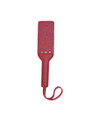 Full view of the red real leather double-layer paddle with a textured finish.