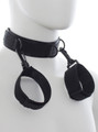 Black nylon collar with wrist cuffs attached for submissive play