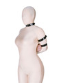 Side view of black armbinder harness locking arms behind back