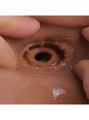 Close-up of anal canal texture in black TPE sex doll