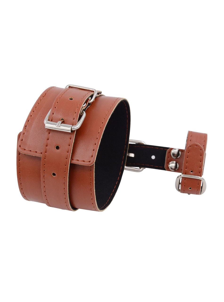 Brown PU leather thumb-to-wrist restraint cuff laid flat