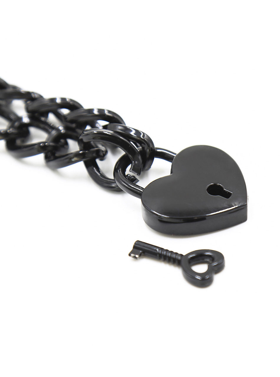 Black heart padlock with matching key on alloy chain