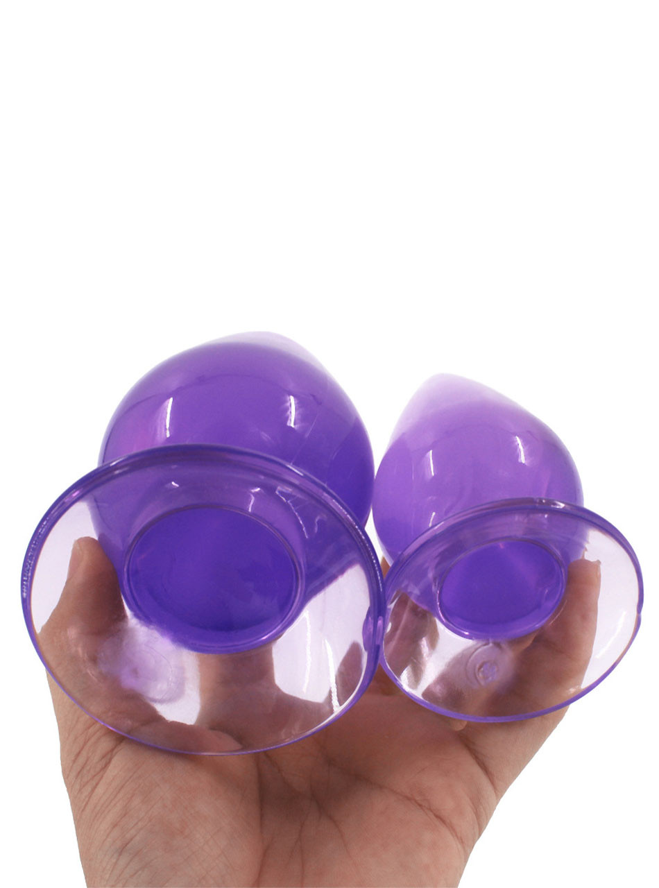 Bottom view of purple TPE plug showing large flared base and smooth finish.