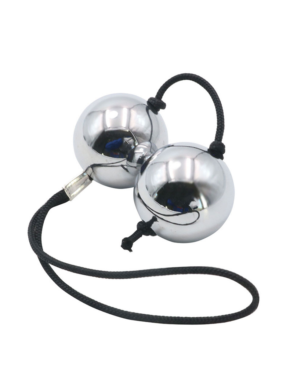 Close-up of polished stainless steel anal beads showing mirror finish and cord attachment.