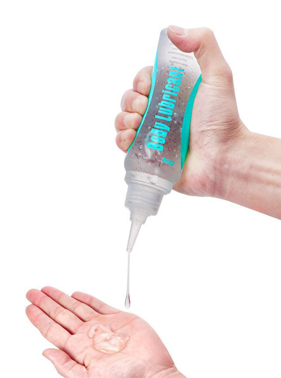 clear lubricant gel pouring from nozzle smooth texture