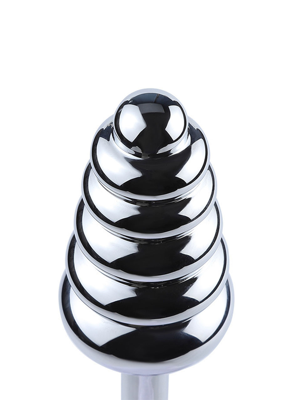 Close-up of the graduated ribbed head on a silver aluminium anal stimulator