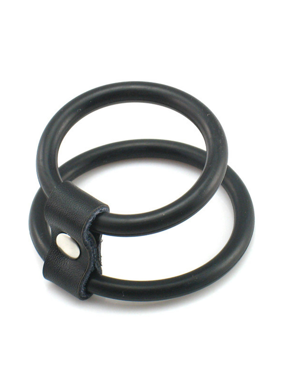 Double loop silicone cock and ball ring with snap connector on white background