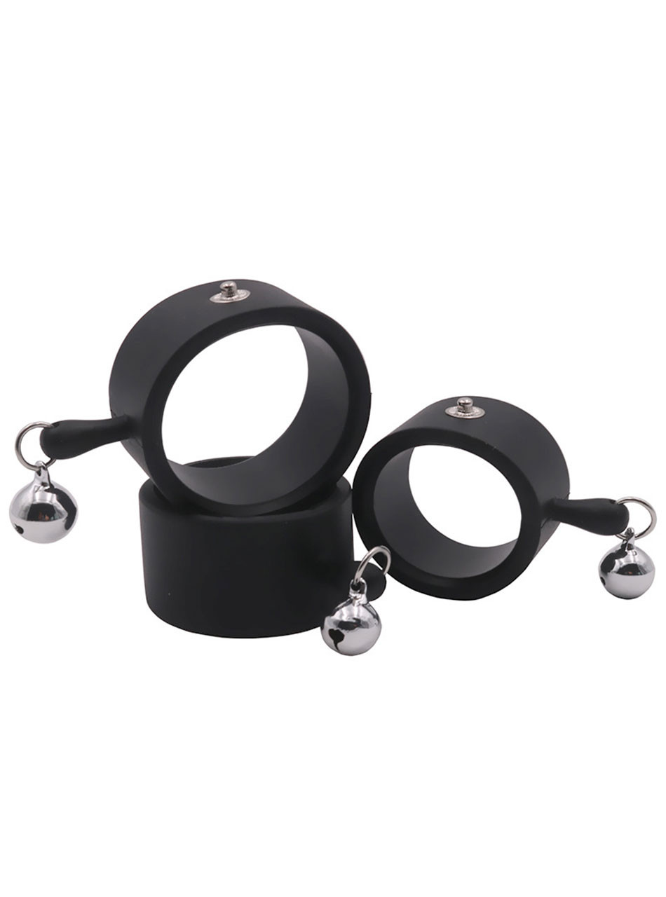 Three black silicone e-stim cock rings in different sizes with hanging metal bells