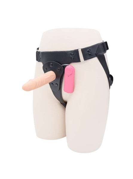 Strap-on harness with vibrating dildo and pink controller attached