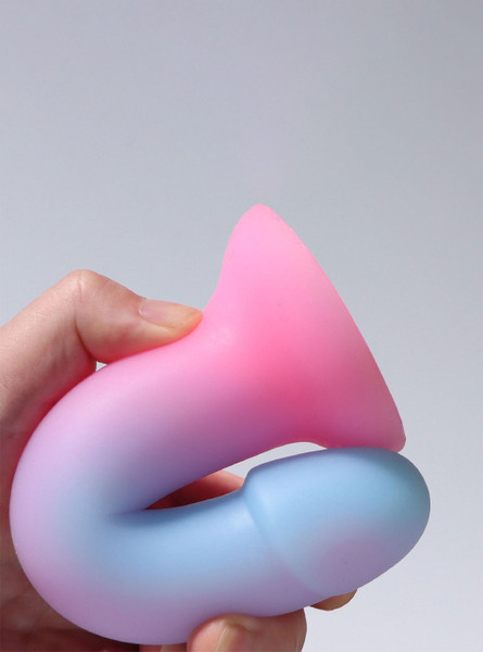 Hand bending ultra-flexible dildo in soft silicone