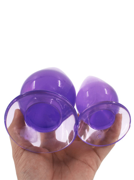 Bottom view of purple TPE plug showing large flared base and smooth finish.