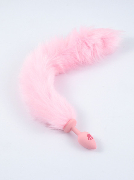 Silicone fox tail butt plug in baby pink with a cute paw print, ideal for playful and comfortable ageplay adventures.