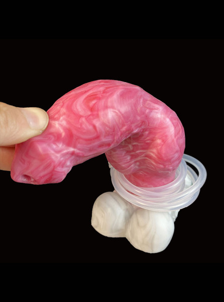 A realistic German Shepherd dildo connected to a bulb, poised to deliver a unique experience.