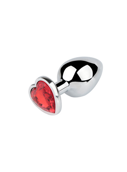 Red heart jewel metal butt plug on a reflective surface, ideal for enhancing anal play.