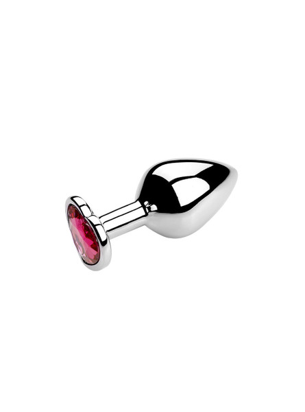 Elegant metal butt plug with a romantic pink heart jewel, perfect for gift-giving or personal indulgence.
