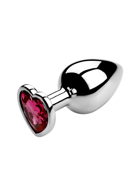 Pink heart jewel metal butt plug on a reflective surface, ideal for enhancing anal play.