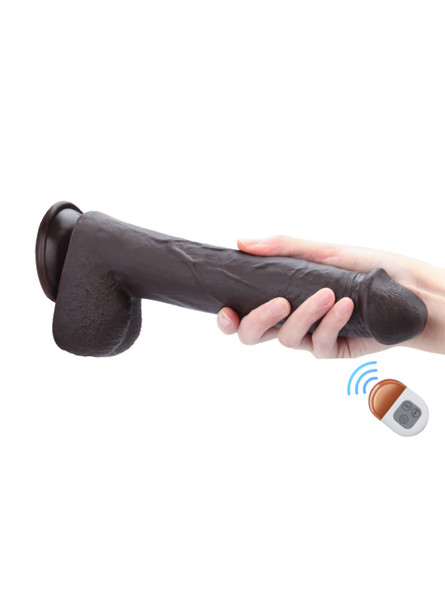 Thick black dildo with suction base and vibration remote
