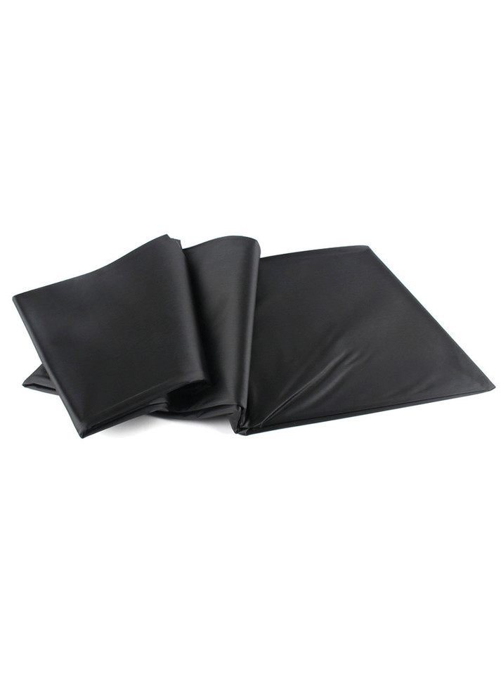 Folded waterproof sex sheet made of shiny, silky polystyrene.
