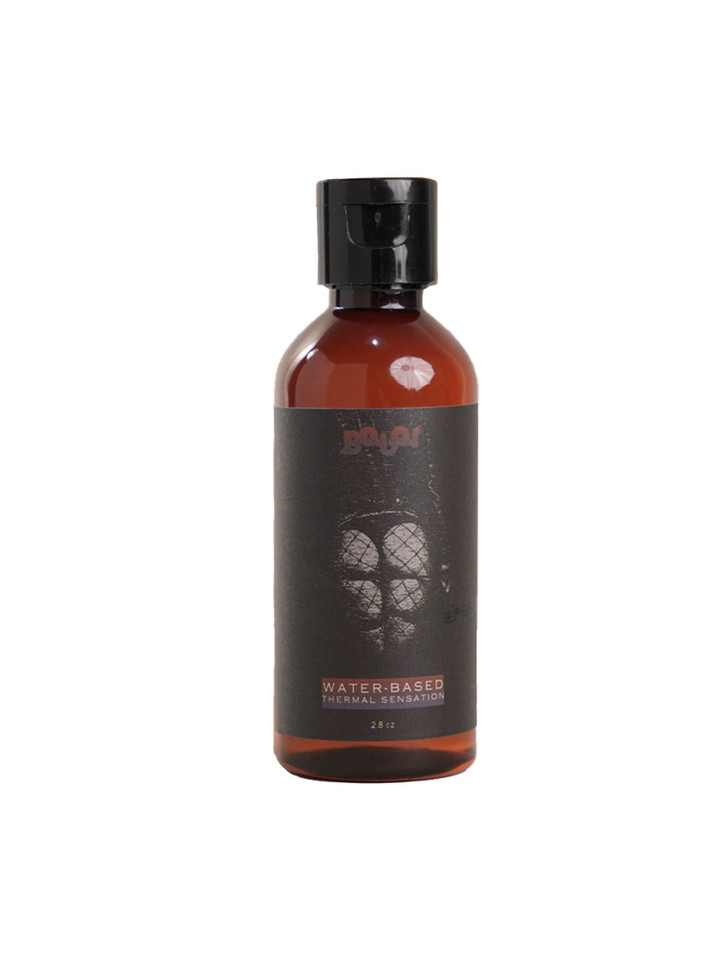 Thermal Sensation Lubricant bottle with black label and muscular chest design.